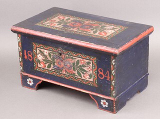 A Northern European painted pine marriage coffer, the top with floral panel dated 1884, raised on bracket feet  25cm h x 45cm w x 26cm d