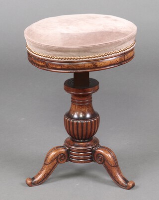 A William IV circular adjustable revolving piano stool raised on a bulbous turned column and tripod base, the seat upholstered in suede 55cm h x 40cm diam.  