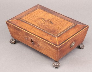 A Regency rectangular cushion shaped trinket box with hinged lid and fitted interior, raised on metal paw feet 8cm h x 22cm w x 16cm d 