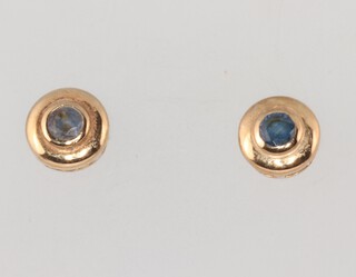 A pair of 9ct gold and sapphire set ear studs