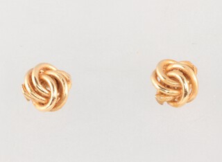 A pair of 18ct gold knot earrings with screw backs, 2.3g