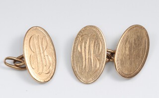 A 9ct gold initialled cufflink and half a cufflink (plain half missing), 6.7g