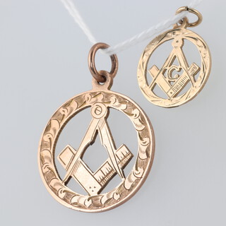 Two Masonic 9ct gold pendants with square and compass decoration, 5g