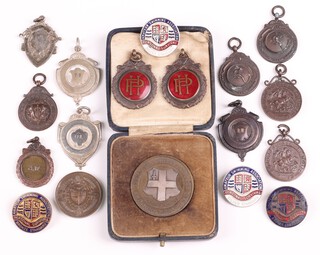 Two bronze sports medallions together with 9 bronzed sporting watch chain medallions, 3 silver plated watch chain medallions and 4 Amateur Swimming Association badges 
