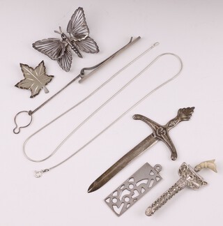 A silver model of a double bladed sword Edinburgh 1991, and a collection of 925 and sterling silver jewellery including pierced silver pendant with millennium hallmark, brooch in the form of a butterfly, fine chain 45cm, tie bar, brooch in the form of a maple leaf 39 grams gross, together with a Malaysian filigree brooch in the form of a Kris dagger 