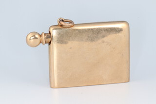 A 9ct gold cased spirit lighter with striker, 15.9g gross