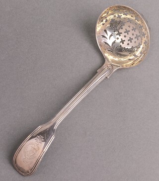 A William IV silver fiddle and thread pattern sifter spoon with armorial decoration, London 1835 by Mary Chawner, 62g 