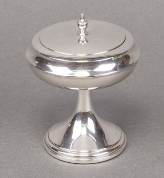 A silver pedestal powder puff, fitted a mirror (a/f), Birmingham 1923, marks rubbed 8cm  