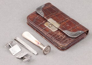 A crocodile and silver mounted purse, a pair of silver cufflinks and silver tie clip 16g, together with a seal  