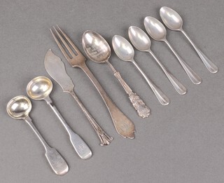 An Edwardian, 17th century style, silver dog nose 3 pronged fork London 1904, a Georgian silver fiddle pattern mustard spoon, 5 silver spoons and a silver butter knife 110g and a silver plated mustard spoon 