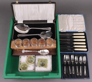 A set of 6 silver plated fruit spoons and server, ditto server and fork, bread knife, 6 tea knives, 6 pasty forks, cake knife, together with a pair of square onyx salts and spoons, all cased, together with a silver plated jam spoon and 5 plated napkin rings  