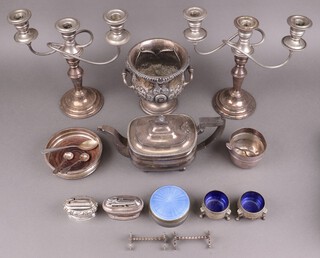 A pair of silver plated 3 light candelabrum, a Georgian style teapot and other plated items 