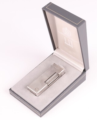 A Dunhill Rollagas silver plated lighter, model RL1302