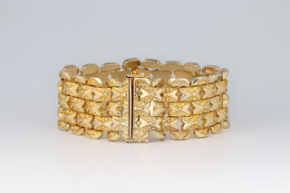 A gold marked 585 bracelet of multiple panel form (some spare links), 20cm, 50g