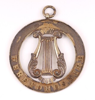 A Victorian silver gilt Masonic Herefordshire Provincial grand organists collar jewel London 1859, maker Abraham David Loewenstark, the reverse engraved Provincial Grand Lodge of Herefordshire July 1859, 47 grams gross 