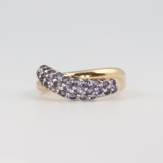 A 9ct gold and amethyst set crossover ring, size N 1/2, 3.3g