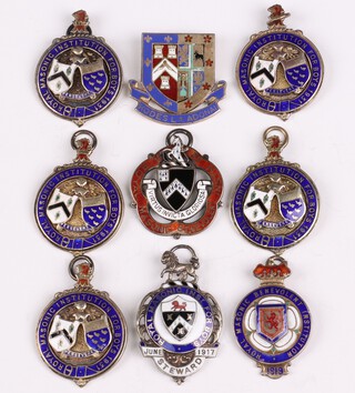 A 1917 silver and enamel Royal Masonic Institute for Boys charity jewel, ditto 1919, 5 x 1937 charity jewels and 2 others, 163 grams gross 