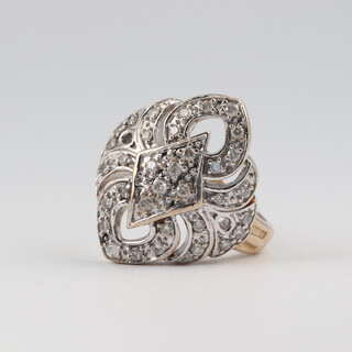 A 9ct gold cocktail ring set numerous diamonds, size M 1/2, 7.9g