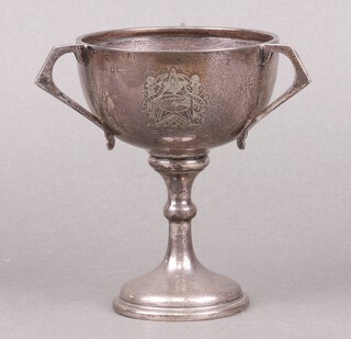 A Masonic 3 handled trophy cup Birmingham 1936, inscribed "Presented to Worshipful Brother Thomas Freelove by The Brethren of The Bostall Heath Lodge no. 4492", 172 grams 