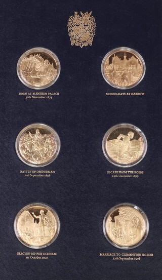 John Pinches, a binder of 24 gilt silver proof Churchill Centenary Medals, Trustees Presentation Edition together with associated paperwork
