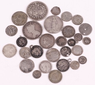 A collection of silver coinage from William and Mary to George V including florins, half crown, sixpence etc, most good, many rubbed and others drilled, 87.7g 