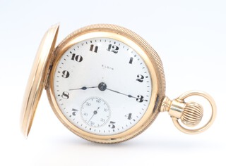 A gentleman's Elgin keyless pocket watch with enamelled dial, Arabic numerals, the movement signed Elgin Natl. Watch Company USA 8843700, contained in a gold case marked 14K, the case marked Keystone 116g gross