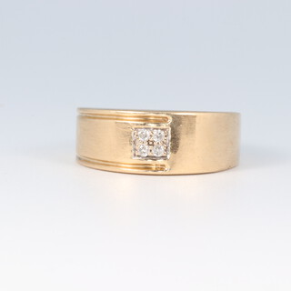 A gold testing as 9ct ring, set 4 diamonds, size S, 4.4g