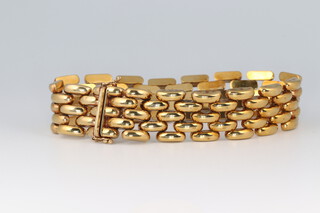 A 9ct gold arched panel flat link bracelet, formed of 5 rows, 20cm, 34.7g