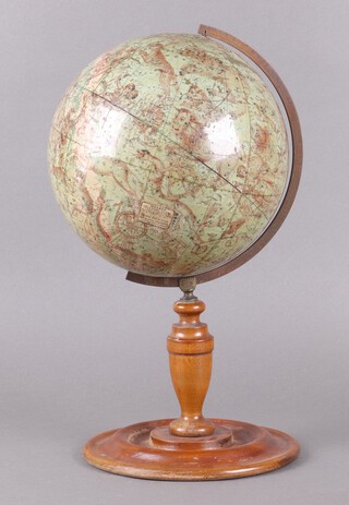 A Malby's 9" celestial globe by George Philips & Sons 9", raised on a turned beech base with cartouche "Malby's celestial globe collated from the works of piazzi bradley Hevelius Mayer La Caille & Johnson George Philip & Son Map & Atlas Publishers 31 & 32 Fleet Street London"