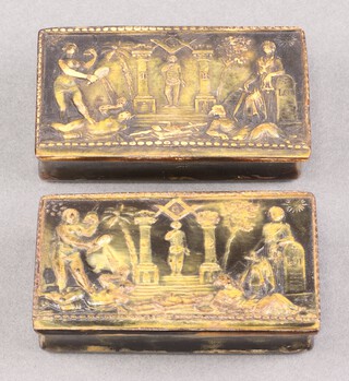 A pair of 19th century Masonic carved horn snuff boxes decorated pillars, square and compasses and figures 3cm x 8cm 