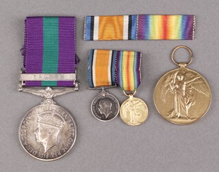 A family group of medals comprising Victory medal to 2nd Lieutenant F E Collins and a General Service Medal Army RAF George VI issue, 1 bar Malaya to APS B Collins Federation of Malaya Police, with 2 miniature medals and an original box 