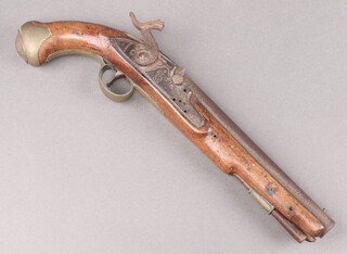 A Georgian percussion lock pistol, the 23cm barrel marked HYCN 06 with tower lock and crowned GR, having a walnut and brass mounted grip marked WM 