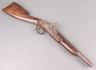 A 19th Century percussion muzzle loading musket,  the 30cm barrel with proof marks, having a later trigger guard and butt guard (possibly reduced in length) 