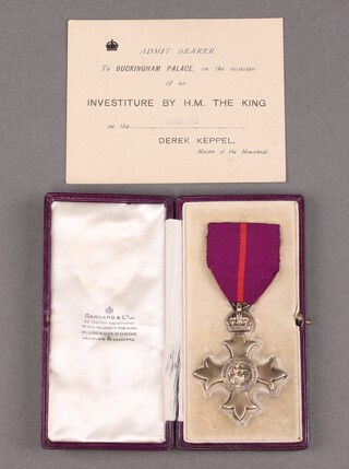 An Officer of The Most Excellent Order of The British Empire Military Division First Issue breast badge, together with an admittance card to Buckingham Palace dated 15th November 1919 