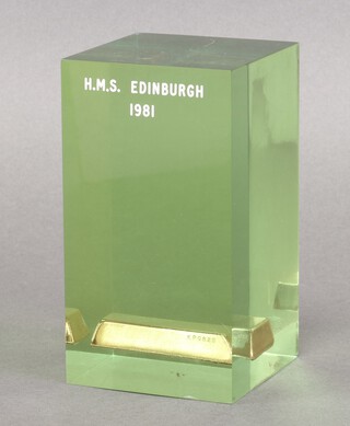 HMS Edinburgh, a perspex and gilt iron paperweight made to commemorate the recovery of gold in 1981 14cm x 8cm 