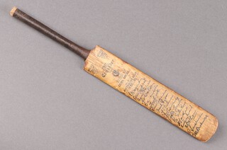 A 1958/1959 M.C.C. Australian Tour miniature cricket bat with numerous facsimile signatures including Colin Cowdrey, John Lock, etc 
