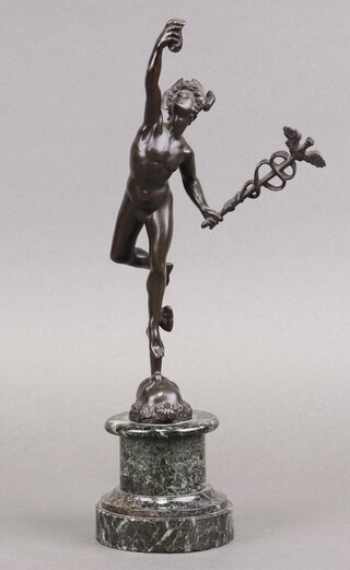 A 19th century bronze figure of a standing Mercury, raised on a turned marble base 34cm 