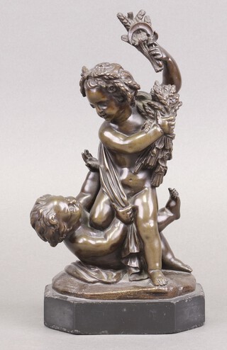After Augustus Moreau, a bronze figure group of 2 cherubs harvesting, on an octagonal black marble base 26cm 