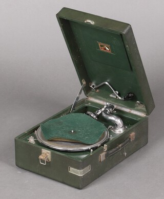 His Masters Voice, a manual gramophone contained in a green fibre case 