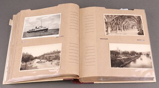 An album of approx. 240 postcards, some early 20th century and later 