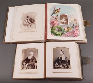 A Victorian leather bound photograph album containing 75 black and white portrait photographs, together with 1 other containing 43 portrait photographs 