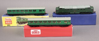 A Hornby Dublo 3250 3-Rail BR Green Electric Motor Coach Brake, together with a 3232 3-Rail Co-Co BR Green Diesel-Electric Locomotive and a 4150 3-Rail SR Green Electric Driving Trailer Coach. all boxed.