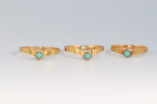 Three yellow metal turquoise set interfitting rings, size M, Q and Q 1/2, 3.4g