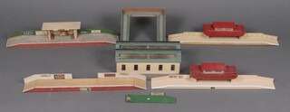 A collection of O and OO gauge pre-war and later wooden buildings to include platforms, warehouse and walkway by Hornby Meccano, Glencoe Toys, Hailey Models, etc.