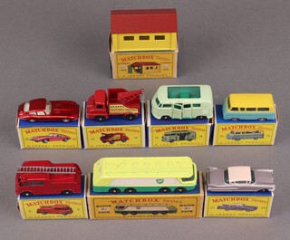 A collection of 1960's boxed Matchbox cars to include 32 E-Type Jaguar, 34 Volkswagen camper van, A3 metal lockup garage, 27 Cadillac sedan, 13 wreck truck, M1 Major BP petrol tanker, 70 Thames estate car and 9 fire truck 