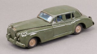 A Japanese 1960's tin plate model of a Rolls Royce in green with friction engine 21cm 