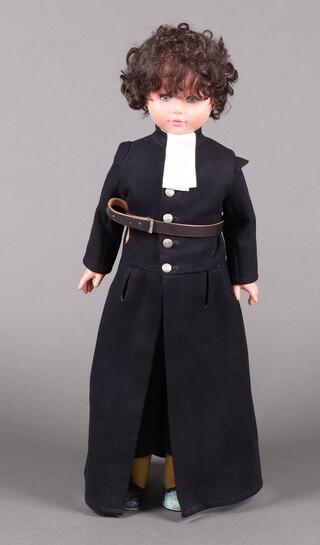 A large rubber doll dressed in the school uniform of a Christ's Hospital student, 84cm h 