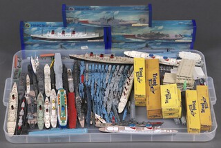A large quantity of boxed and unboxed Tri-ang and Hornby Minic ships, including RMS queen Mary, HMS Superb and others, approximately 50 including liners, warships and pier heads and docks