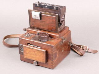 A 1920s Houghton-Butcher Ensign 120 Roll Film Reflex Tropical SLR camera, appears to have bespoke modifications 