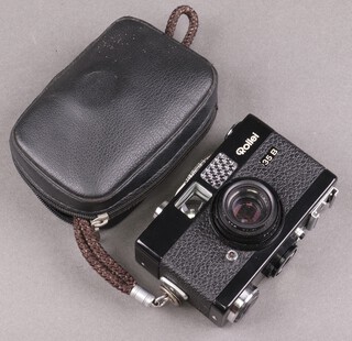 A Rollei 35B 35mm compact camera, fitted an Triotar 3.5/4.0mm lens with Hoya filter together with soft carry case.